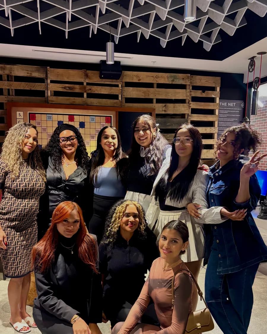 Alpha Society members together at an indoor event
