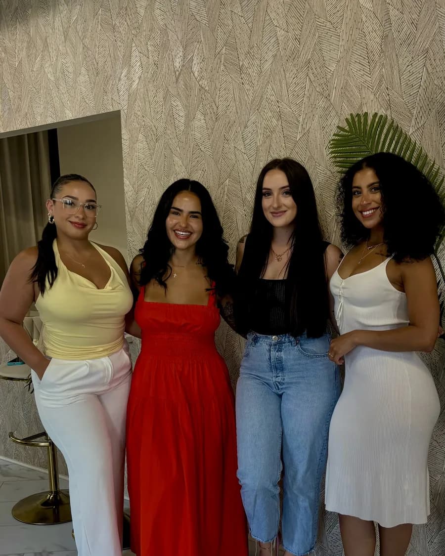 Four Alpha Society members together at an event
